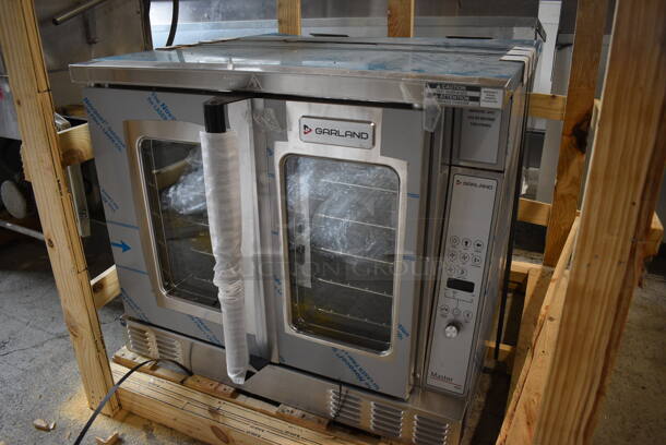 BRAND NEW! 2021 Garland Model MCO-GS-10 Stainless Steel Commercial Natural Gas Powered Full Size Convection Oven w/ view Through Doors, Metal Oven Racks and Thermostatic Controls. Stock Picture Used For Gallery. Does Not Include Legs. 60,000 BTU. 38x38x33 - Image 2 of 10