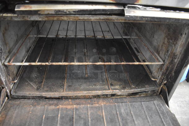 Garland Sunfire Commercial Stainless Steel Natural Gas Powered 10 Burner Range With 2 Standard Ovens, Overhself And Steel Racks. - Image 5 of 6