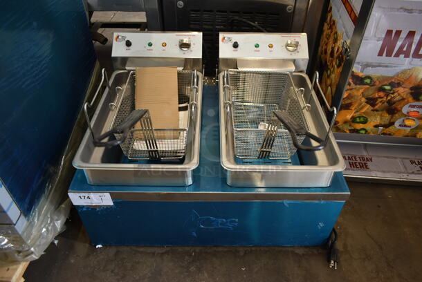 BRAND NEW SCRATCH AND DENT! Cooking Performance Group CPG DF-18-2 Stainless Steel Commercial Floor Style Electric Powered Double Bay Deep Fat Fryer w/ 2 Metal Fry Baskets. 208-240 Volts. Tested and Working! - Image 1 of 8