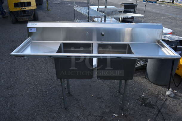 Stainless Steel Commercial 2 Bay Sink w/ Dual Drain Boards, Faucet and Handles. 72x23x45. Bays 17x17x12. Drain Boards 16.5x19x1 - Image 1 of 8