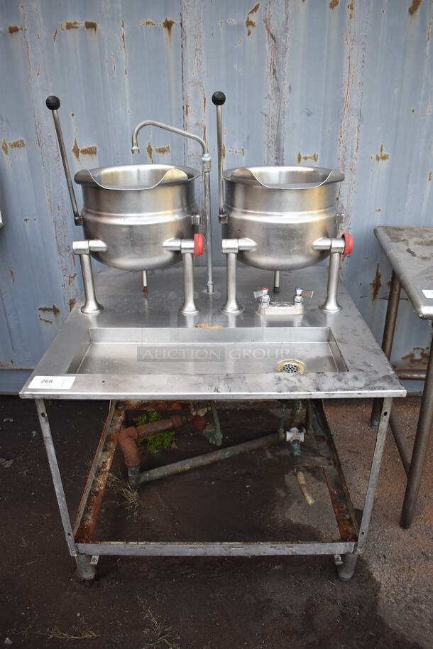 Cleveland Stainless Steel Commercial Tilting Kettle Stand w/ 2 Cleveland KDT-6T Tilting Steam Kettles. 35.5x34x55