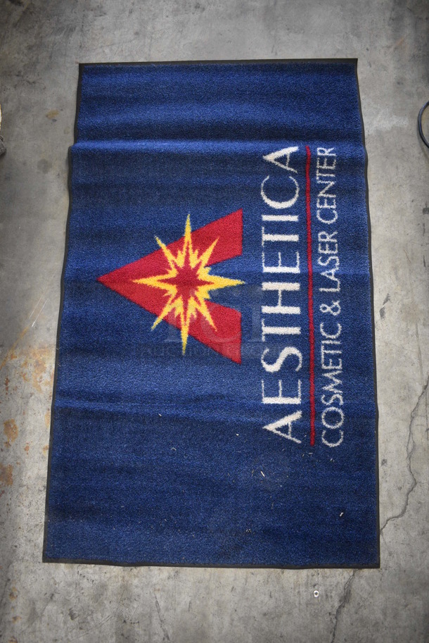 Blue Floor Rug w/ Aesthetica Logo. 57x33.5