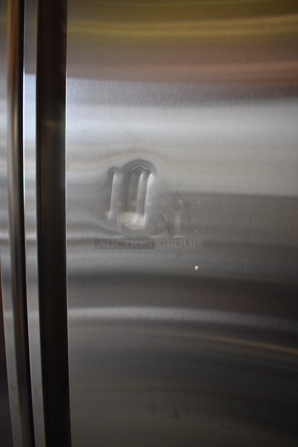 BRAND NEW SCRATCH AND DENT! Avantco Model 178SS2FHC Stainless Steel Commercial Two Door Reach In Freezer w/ Poly Coated Racks on Commercial Casters. 115 Volts, 1 Phase. 54x32x77.5. Tested and Working! - Image 7 of 7