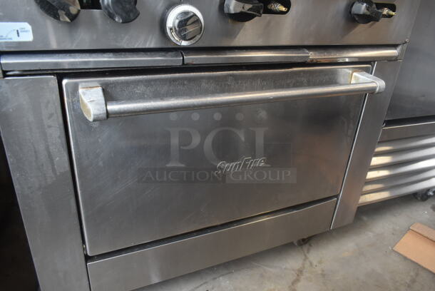 Garland SunFire Stainless Steel Commercial Natural Gas Powered 6 Burner Range w/ Oven and Back Splash on Commercial Casters.  - Image 5 of 8
