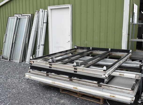 ALL ONE MONEY! Lot of Metal Frame Pieces w/ 14 Glass Doors. Door Frame Measures 70x9x76. - Image 1 of 9