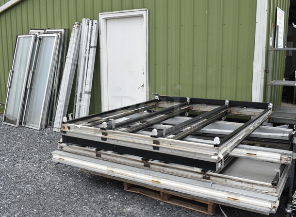 ALL ONE MONEY! Lot of Metal Frame Pieces w/ 14 Glass Doors. Door Frame Measures 70x9x76.