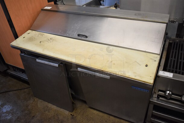 McCall Stainless Steel Commercial Sandwich Salad Prep Table Bain Marie Mega Top on Commercial Casters. One Caster and One Door Need To Be Reattached. 115 Volts, 1 Phase. 59x30x43. Tested and Powers On But Temps at 41 Degrees