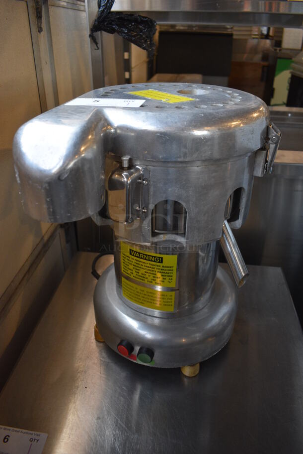 Omcan J110 Stainless Steel Commercial Countertop Electric Powered Juicer. 110 Volts, 1 Phase. 15x17x19. Tested and Working!