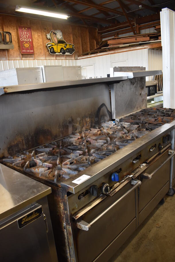 Garland SunFire Stainless Steel Commercial Natural Gas Powered 10 Burner Range w/ 2 Ovens, Over Shelf and Back Splash on Commercial Casters.  - Image 2 of 8