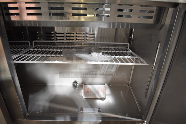 BRAND NEW SCRATCH AND DENT! 2023 Avantco 178SSPT60MHC Stainless Steel Commercial Sandwich Salad Prep Table Bain Marie Mega Top w/ Commercial Casters. See Pictures for Crushed Top. 115 Volts, 1 Phase. Tested and Powers On But Does Not Get Cold
 - Image 7 of 9
