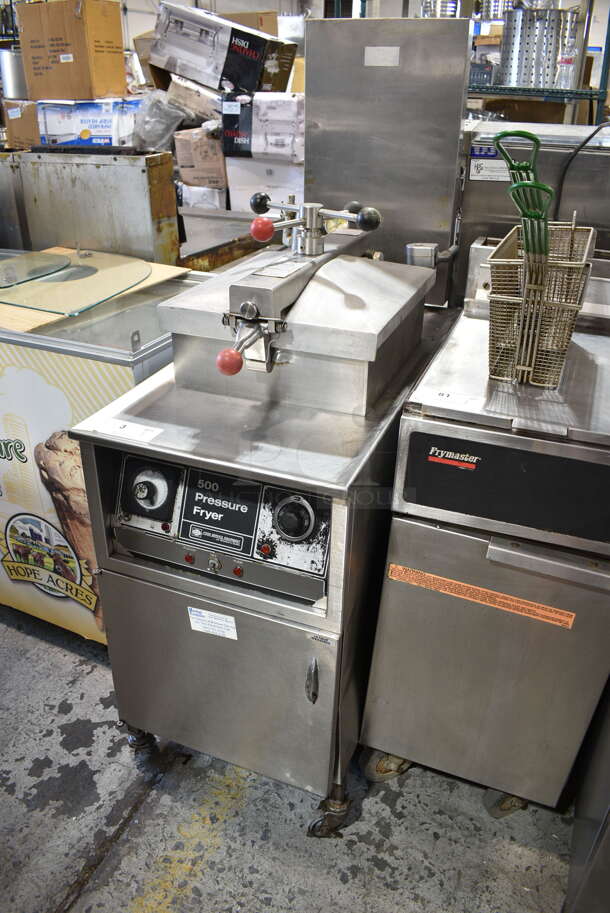 Henny Penny 500 Stainless Steel Commercial Floor Style Electric Powered Pressure Fryer w/ Metal Fry Basket on Commercial Casters. 208 Volts, 3 Phase.  - Image 2 of 10