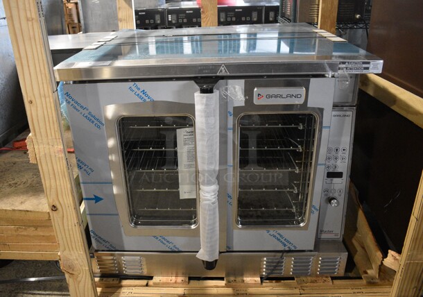BRAND NEW! 2021 Garland Model MCO-GS-10 Stainless Steel Commercial Natural Gas Powered Full Size Convection Oven w/ view Through Doors, Metal Oven Racks and Thermostatic Controls. Stock Picture Used For Gallery. Does Not Include Legs. 60,000 BTU. 38x38x33 - Image 2 of 8
