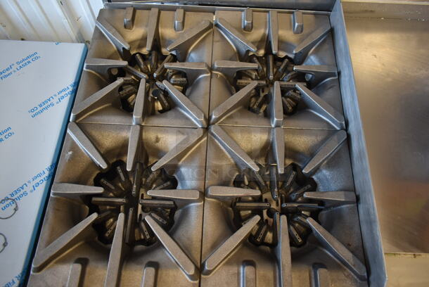 BRAND NEW SCRATCH AND DENT! Garland G60-4G36RR Stainless Steel Commercial Natural Gas Powered 4 Burner Range w/ Flat Top, 2 Ovens, Over Shelf and Back Splash.  - Image 3 of 10