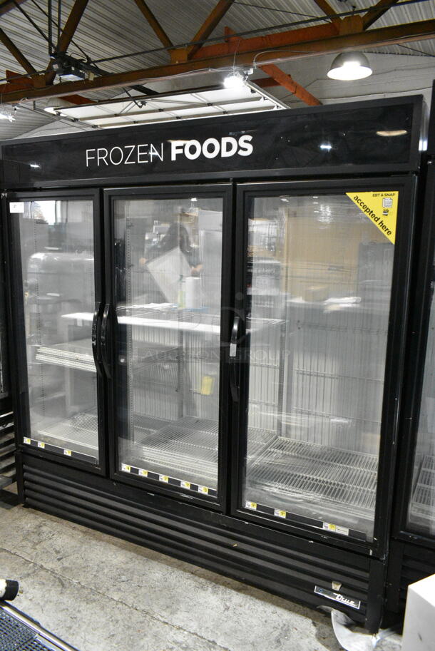 2017 True GDM-72F-HC Metal Commercial 3 Door Reach In Freezer Merchandiser w/ Poly Coated Racks. 115/208-230 Volts, 1 Phase.  - Image 1 of 7