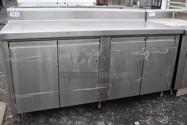 Stainless Steel Commercial Table w. 4 Doors and Back Splash. 72x32.5x42.5