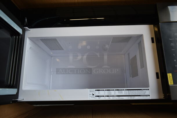 BRAND NEW SCRATCH AND DENT! Frigidaire FFMV1645TD Metal Microwave Oven.  - Image 4 of 5