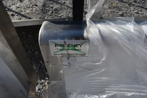 BRAND NEW SCRATCH AND DENT! Regency 600HSMSB1896 Stainless Steel Commercial Wall Mount Trough Style Sink.  - Image 3 of 4