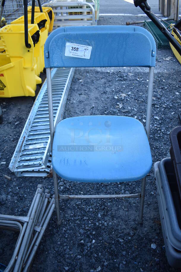 6 Blue Folding Chairs. 17x2x37. 6 Times Your Bid!