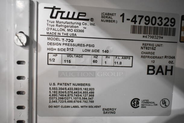 True T-72G Stainless Steel Commercial 3 Door Reach In Cooler Merchandiser w/ Poly Coated Racks on Commercial Casters. 115 Volts, 1 Phase. Tested and Working! - Image 9 of 9