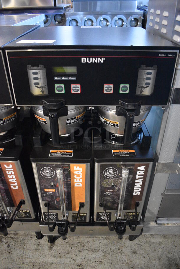 2012 Bunn Model DUAL SH DBC Stainless Steel Commercial Countertop Dual Coffee Machine w/ 2 Stainless Steel Brew Baskets and 2 Bunn Model SH SERVER Satellite Servers. 120/208-240 Volts, 1 Phase. 18x24x36. Tested and Working!