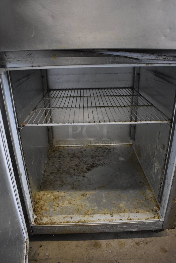 Delfield Model MFR1-SH Stainless Steel Commercial 2 Half Size Door Reach In Freezer w/ Poly Coated Racks on Commercial Casters. 115 Volts, 1 Phase. 29x34x79. Tested and Powers On But Temps at 45 Degrees - Image 6 of 6