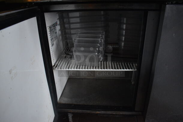 2011 True TSSU-72-30M-B-ST Stainless Steel Commercial Pizza Prep Table on Commercial Casters. BUYER MUST REMOVE. 115 Volts, 1 Phase. 72x34x38. Item Was in Working Condition on Last Day of Business. (Susquehanna Ale House) - Image 6 of 8