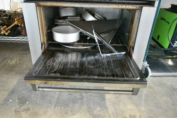 Garland SunFire Stainless Steel Commercial Natural Gas Powered 6 Burner Range w/ Oven, Back Splash and Contents on Commercial Casters.  - Image 5 of 7