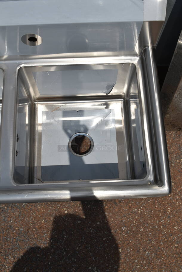 BRAND NEW SCRATCH AND DENT! Regency 600S21717 41" 16-Gauge Stainless Steel Two Compartment Commercial Sink with Galvanized Steel Legs and without Drainboards - 17" x 17" x 12" Bowls. No Legs.  - Image 4 of 6