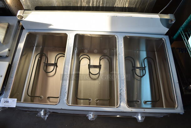 BRAND NEW SCRATCH AND DENT! 2024 ServIt 423EST3WO Stainless Steel Commercial Electric Powered 3 Bay Steam Table w/ Under Shelf. 120 Volts, 1 Phase. Tested and Working! - Image 3 of 7