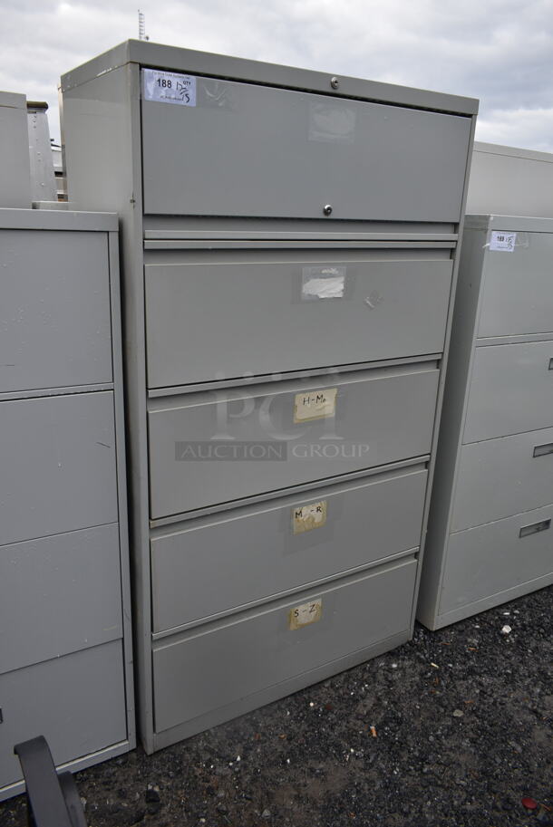 Metal 4 Drawer and 1 Cabinet Filing Cabinet.