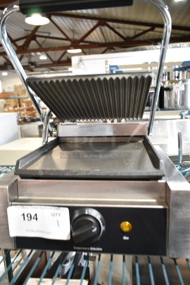 BRAND NEW SCRATCH AND DENT! 2023 Galaxy 177P65SG Stainless Steel Commercial Countertop Single Panini Sandwich Grill with Grooved Top and Smooth Bottom Plates - 8 1/2" x 8 1/2" Cooking Surface. 120 Volts, 1 Phase. Tested and Working! - Image 5 of 6