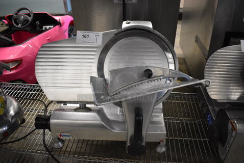 Omcan Stainless Steel Commercial Countertop Meat Slicer w/ Blade Sharpener. 24x21x19. Cannot Test - Needs New Power Switch