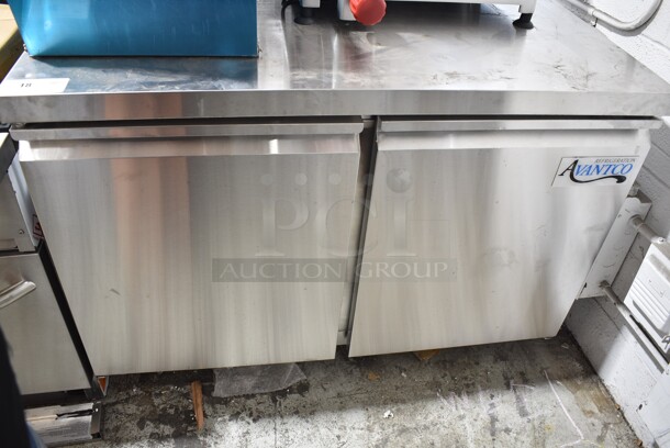 BRAND NEW SCRATCH AND DENT! 2024 Avantco 178SSUC48FHC Stainless Steel Commercial 2 Door Undercounter Freezer on Commercial Casters. 115 Volts, 1 Phase. Tested and Working!  - Image 2 of 6
