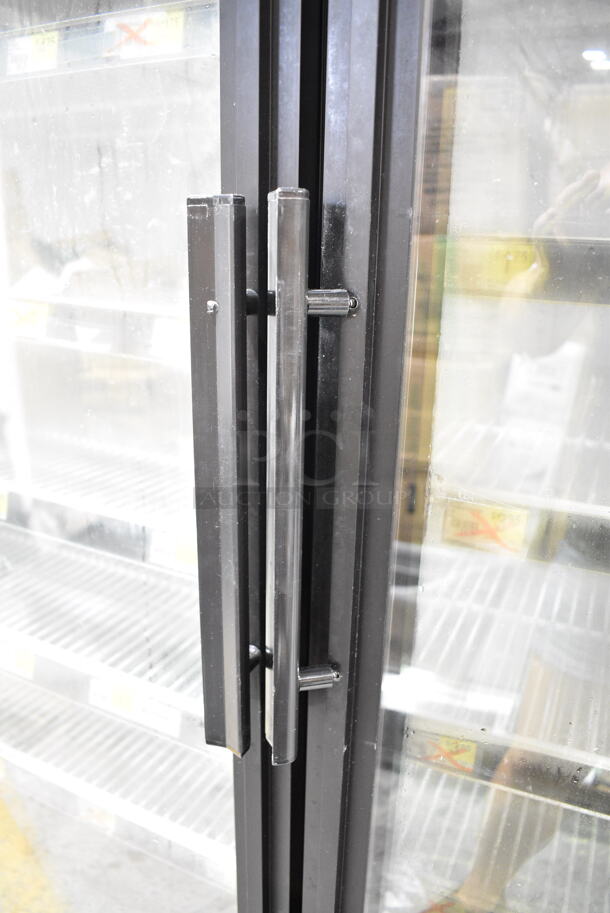2015 True GDM-49-LD ENERGY STAR Metal Commercial 2 Door Reach In Cooler Merchandiser w/ Poly Coated Racks on Commercial Casters. 115 Volts, 1 Phase. Tested and Working! - Image 3 of 6