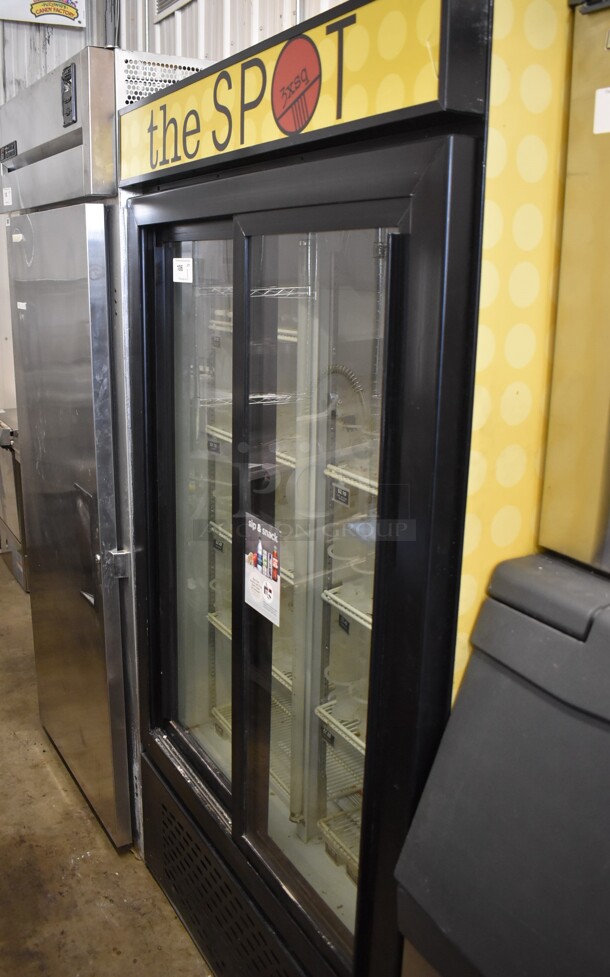Universal MC1100S-1 Metal Commercial 2 Door Reach In Cooler Merchandiser. 115 Volts, 1 Phase. 43.5x31.5x79. Tested and Powers On But Does Not Get Cold