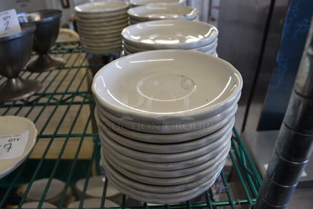 57 White Ceramic Saucers. 5.5x5.5x1. 57 Times Your Bid!