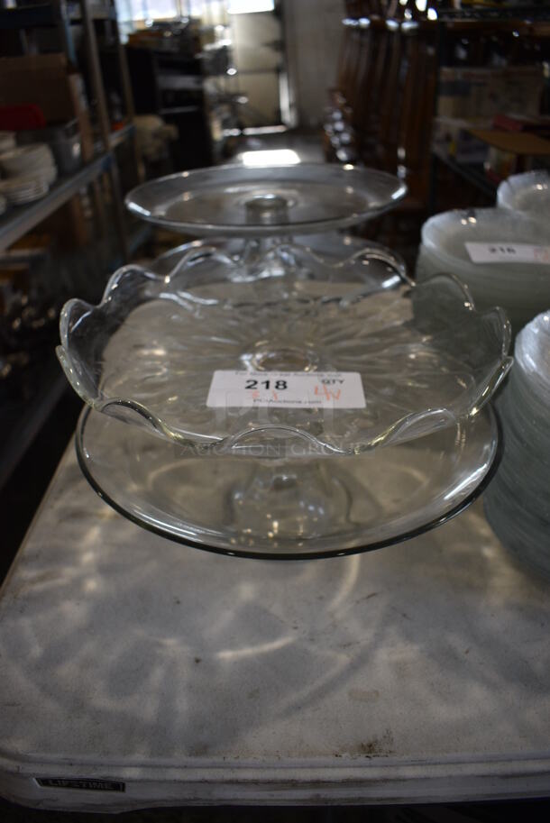 4 Various Glass Cake Stands. 13x13x4.5, 12.5x12.5x5. 4 Times Your Bid!