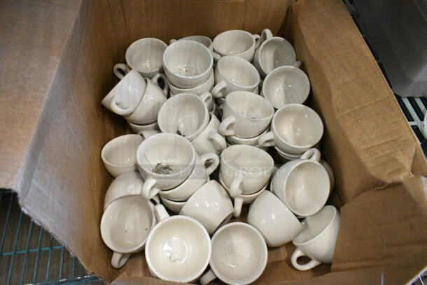 ALL ONE MONEY! Lot of 50 Clear Ceramic Mugs.  - Image 1 of 6