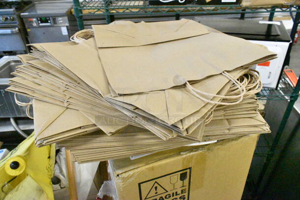 PALLET LOT of 20 BRAND NEW Boxes Including ECAL22SBPBLMAT Airpot with Lever Glass Lined, Choice 433NHT105 1/5 Large Size White "Thank You" Script Medium-Duty Plastic T-Shirt Bag - 500/Case, Choice 43302CUPC 2-Compartment Clear OPS Plastic Cupcake / Muffin Container, Brown Paper Bags, Choice 167CBR21NLHN Hair Nets, Wet Floor Pop Up Signs, Choice #16 Disher, DW 15430 Loaf Pans, Metal Baskets, Chef Master Grill Brush, LK Packaging BOR5280 Bun Pan Covers w/ Twist Ties - 80" x 52", Poly, Choice 12212105BX 12" x 10 3/4" Food Service Interfolded Pop-Up Foil Sheets - 500/Box. 20 Times Your Bid!  - Image 7 of 12