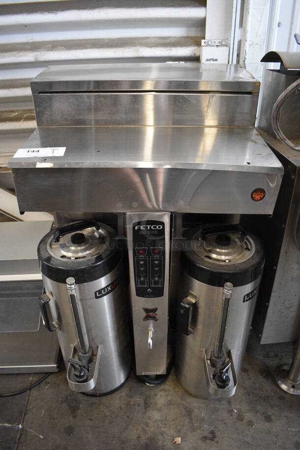 Fetco CBS-2052e Stainless Steel Commercial Countertop Dual Coffee Machine w/ 2 Servers. 120/208-240 Volts, 1 Phase. 22x23x35