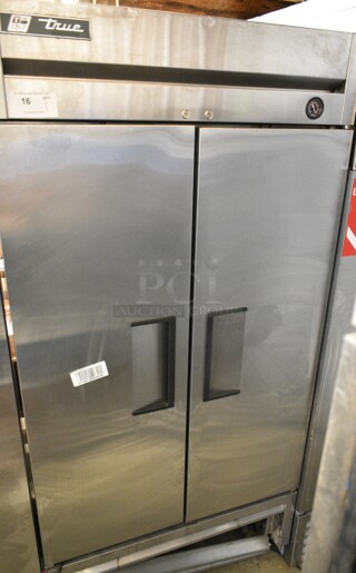 2017 True T-35 Stainless Steel Commercial 2 Door Reach In Cooler w/ Poly Coated Racks on Commercial Casters. 115 Volts, 1 Phase. Tested and Working!