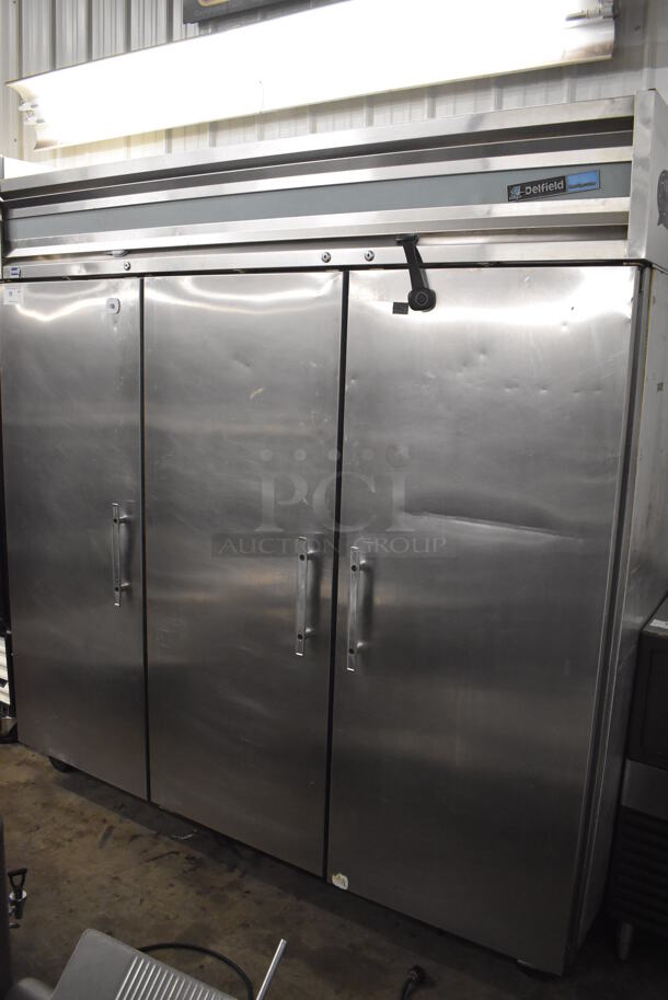 Delfield Stainless Steel Commercial 3 Door Reach In Cooler w/ Poly Coated Racks on Commercial Casters. 77x34x80. Tested and Working! - Image 3 of 9