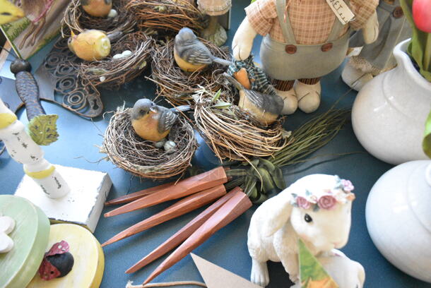 Wall Mount Table w/ Contents Including Spring Decor. BUYER MUST REMOVE: Bring Tools and Manpower Needed To Remove This Item. (booth room)  - Image 8 of 8