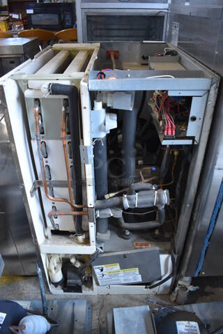 Hoshizaki Model KM-650MAH Stainless Steel Commercial Ice Machine Head. Missing Front and Top Panels. 208-230 Volts, 1 Phase. 22x27x38