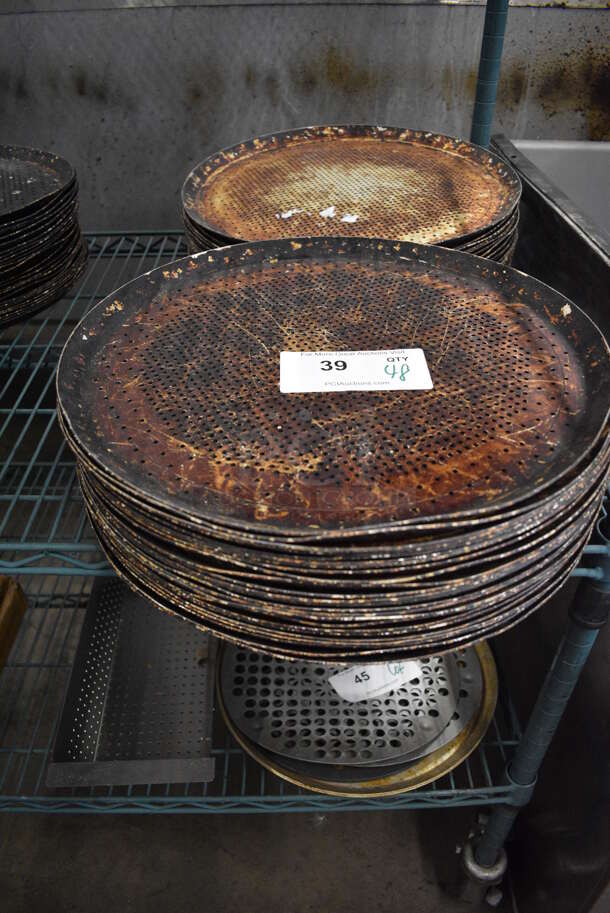 48 Metal Perforated Round Baking Pans. 15.25x15.25x1. 48 Times Your Bid!