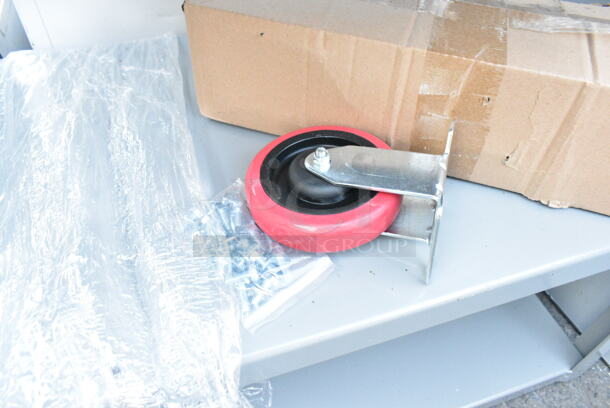 BRAND NEW SCRATCH AND DENT! Lavex Gray Metal 3 Tier Cart w/ Commercial Casters.  - Image 5 of 7