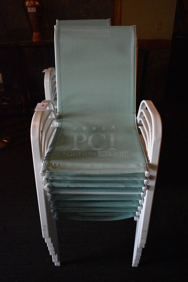 8 Metal White Outdoor Chairs w/ Teal Seat and Arm Rests. BUYER MUST REMOVE. 22x27x37. 8 Times Your Bid! (Susquehanna Ale House)