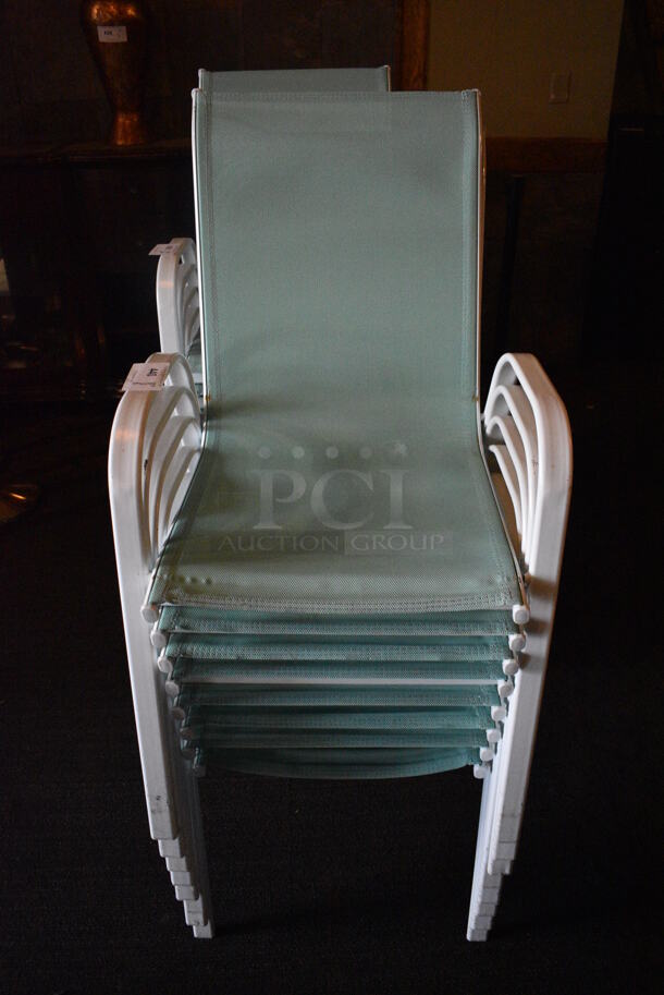 8 Metal White Outdoor Chairs w/ Teal Seat and Arm Rests. BUYER MUST REMOVE. 22x27x37. 8 Times Your Bid! (Susquehanna Ale House) - Image 1 of 4