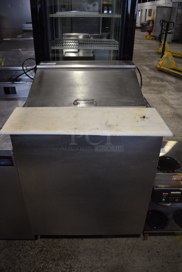Stainless Steel Commercial Sandwich Salad Prep Table Bain Marie Mega Top w/ Various Drop In Bins and Cutting Board. 27.5x32x43. Tested and Powers On But Temps at 52 Degrees