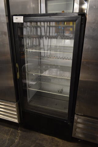 QBD CD10 H Metal Commercial Single Door Reach In Cooler Merchandiser w/ Poly Coated Racks. 115 Volts, 1 Phase. Tested and Powers On But Does Not Get Cold